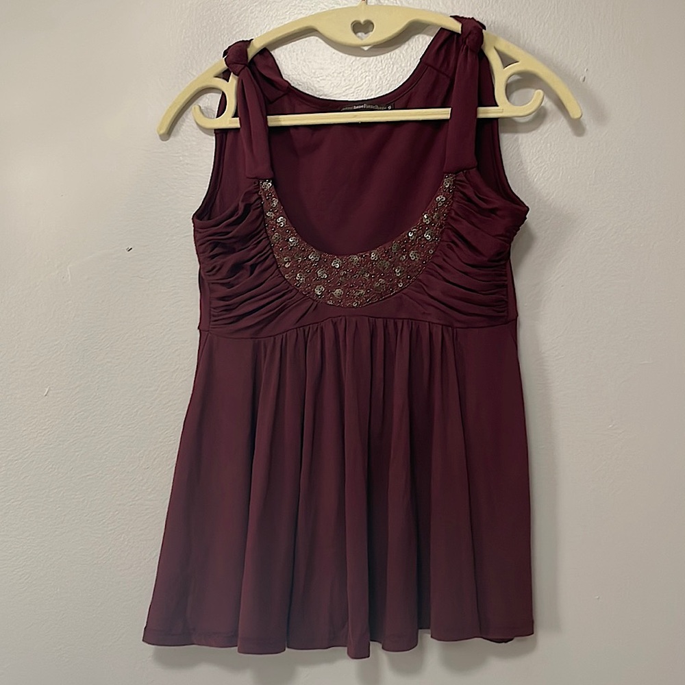 Pretty dark wine colored top. Sz small